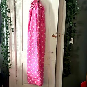 Pink polka dotted curtain
